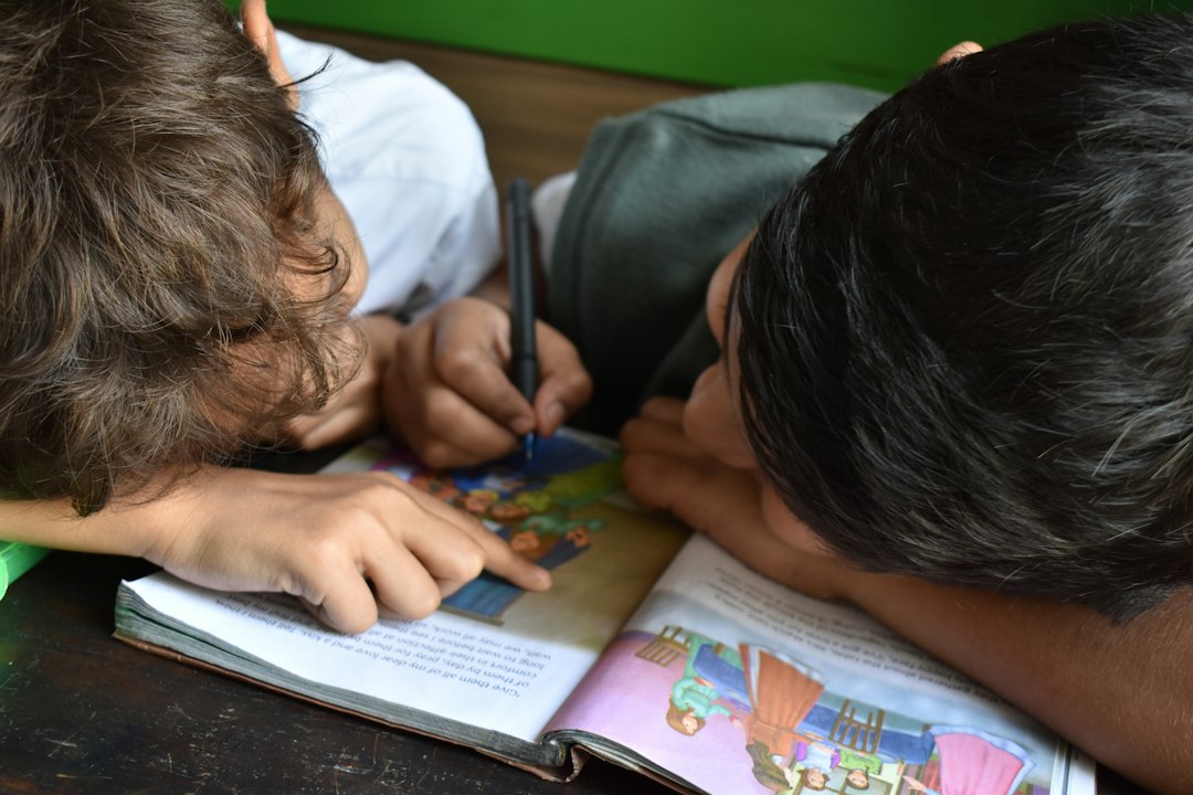Children reading and smiling happily